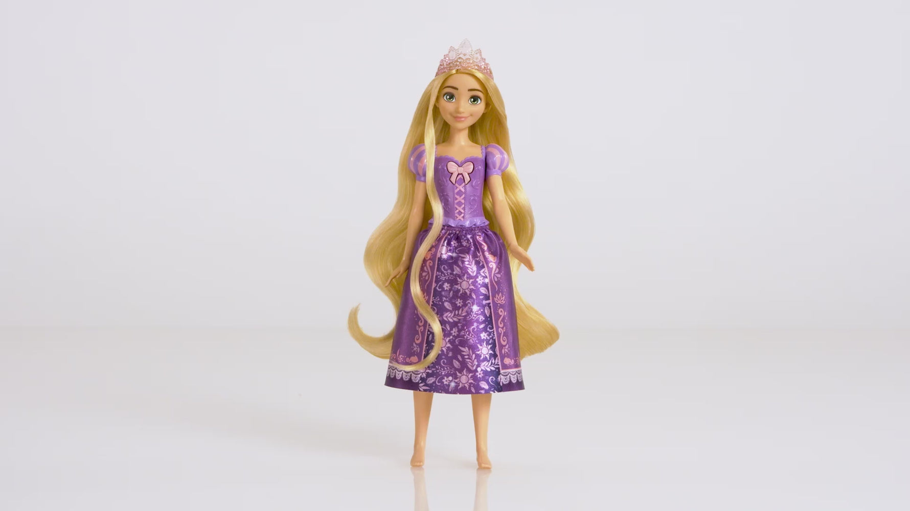 Mattel Disney Princess - Pevska lutka Rapunzel (angleški jezik) (HPD41)